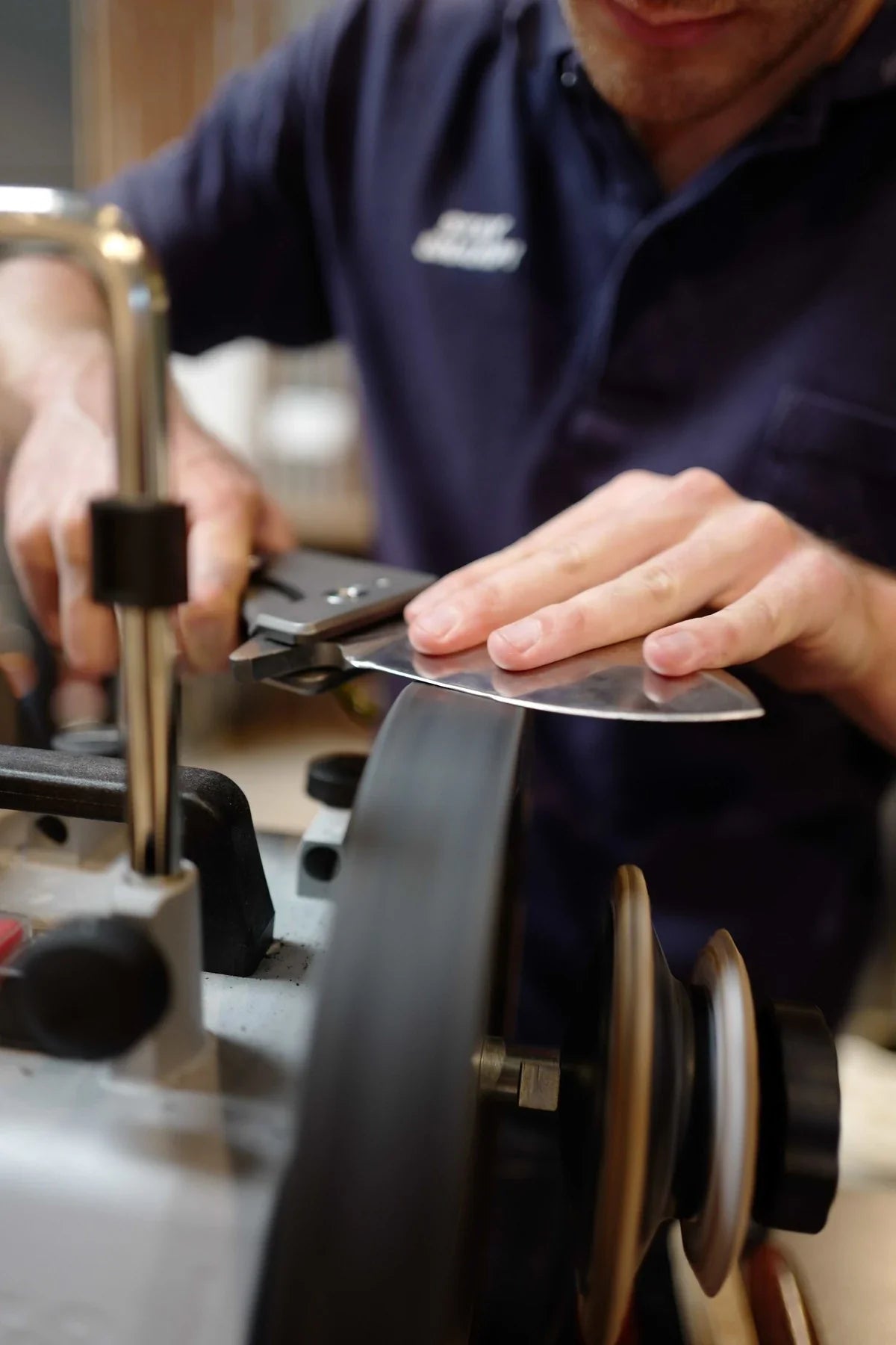 A WESN knife being sharpened