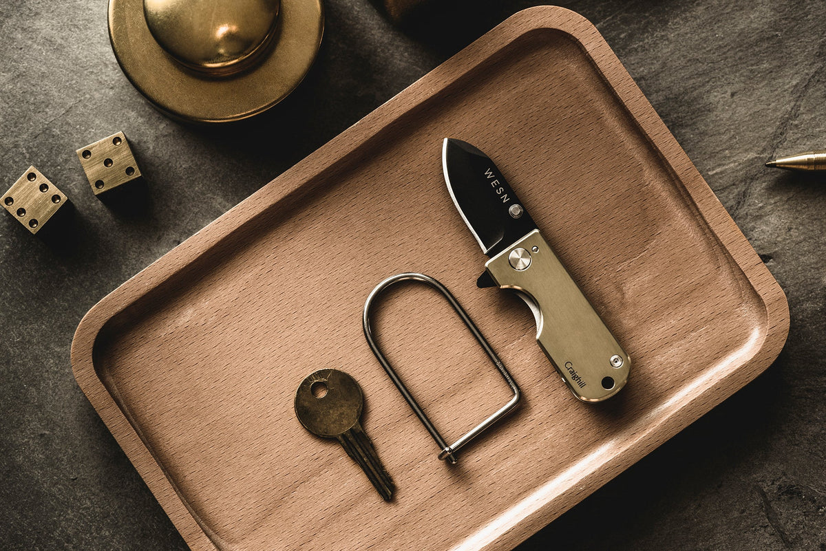 WESN × Craighill Microblade on a brass tray