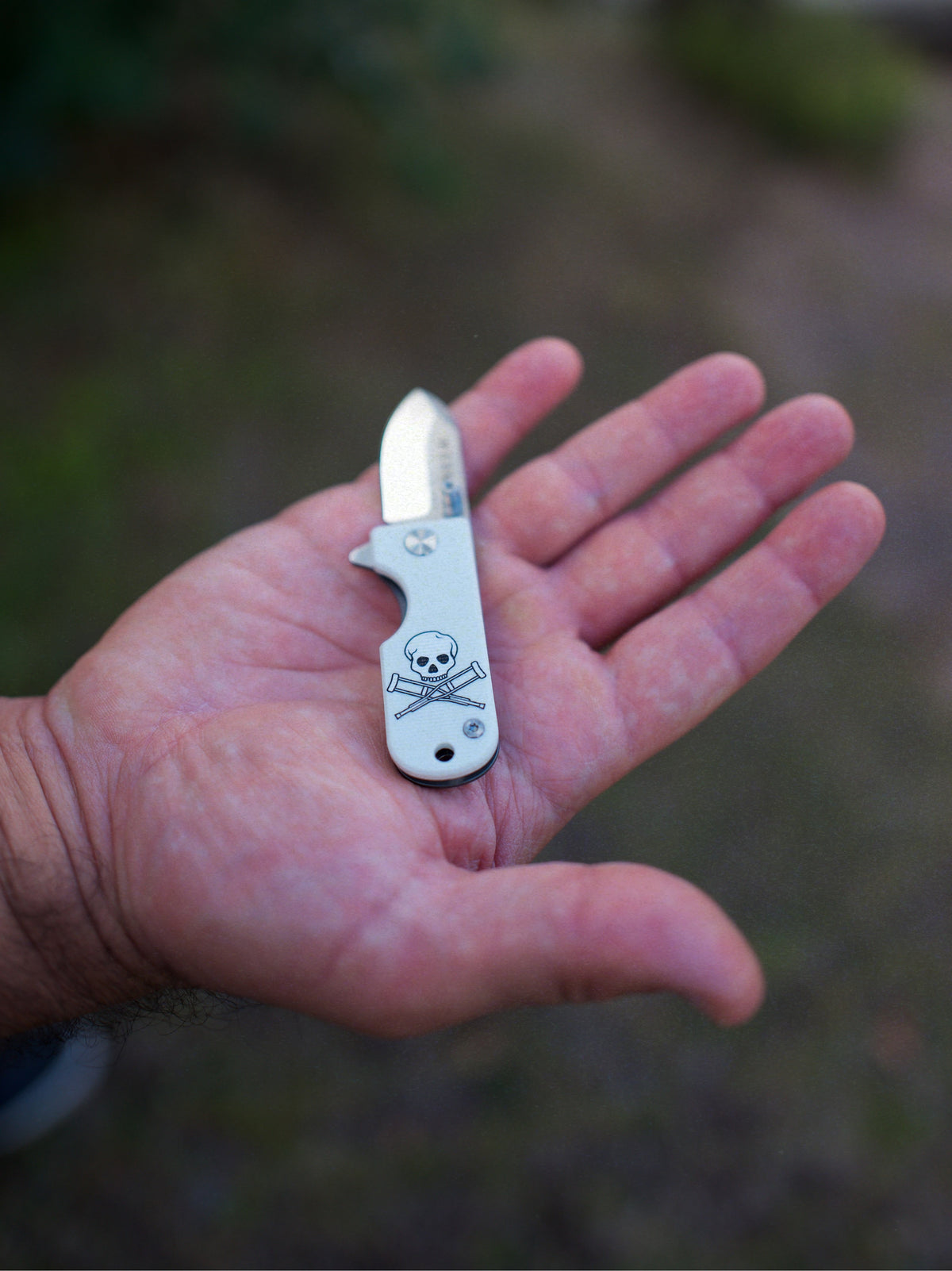 WESN × Jackass: the custom Microblade in hand